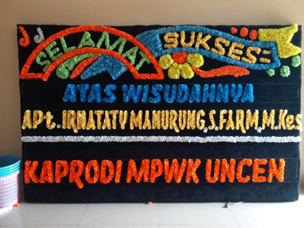 Papan bunga wisuda Makassar